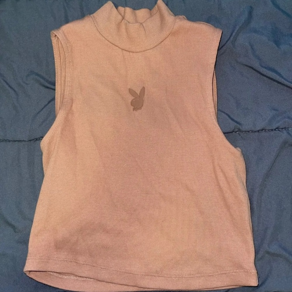 Maybe playboy pacsun top